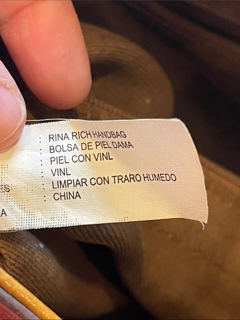Rina Rich Brown and Tan Leather and vinyl Handbag Label View